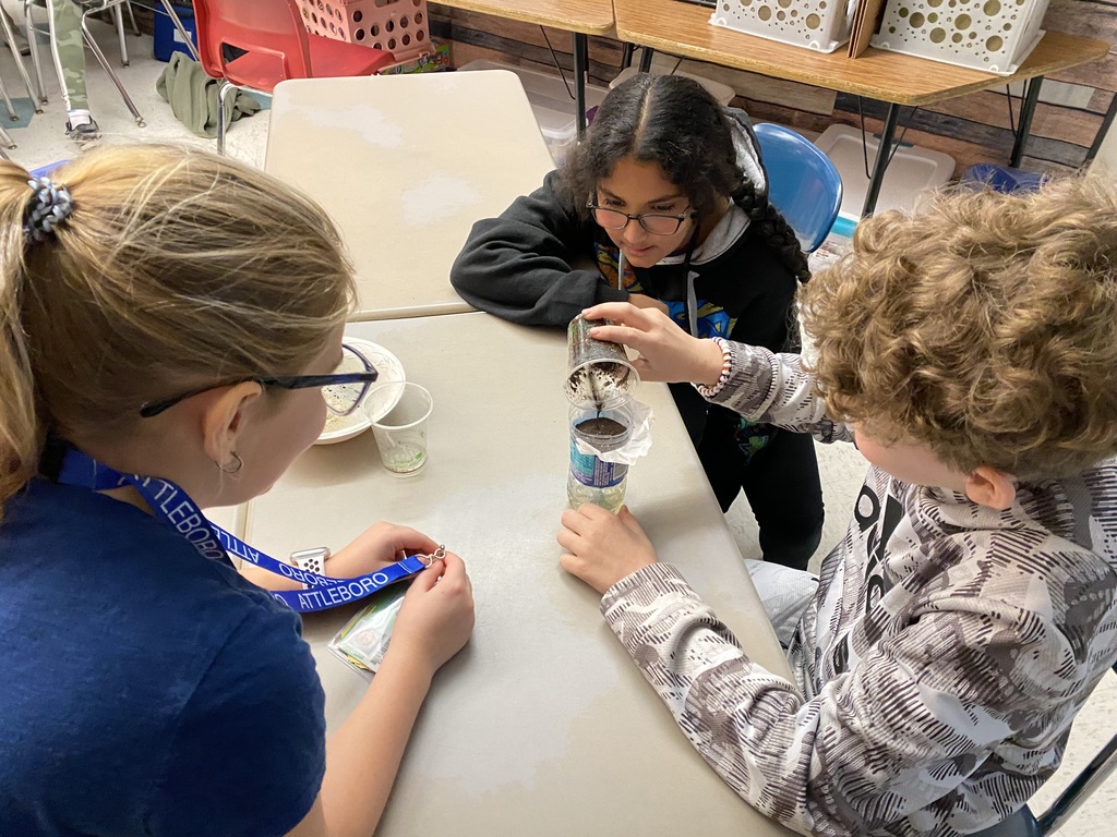 Students testing water filters they created