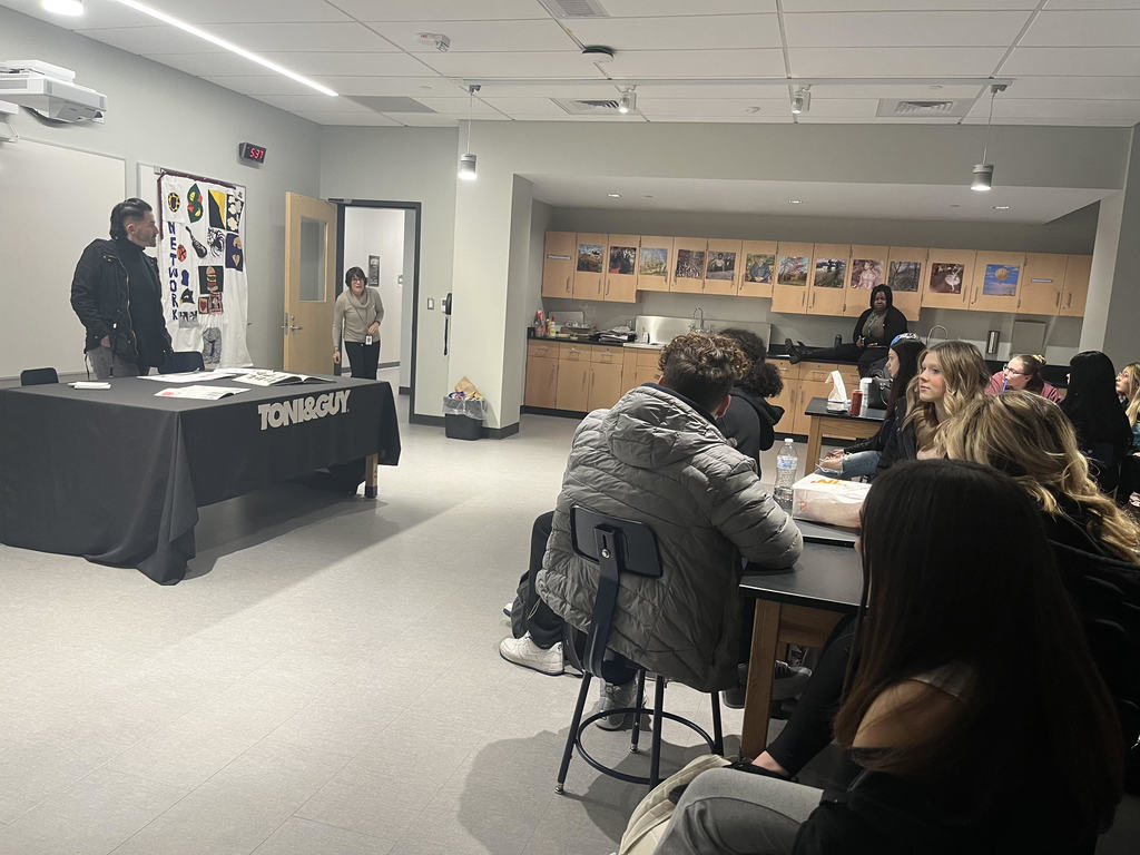 Students attending a presentation from TONI&GUY Hairdressing Academy